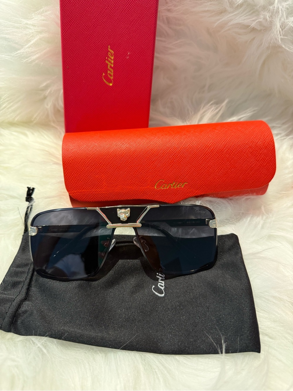 Sunglasses Case - Likely Wallet/Small Accessory